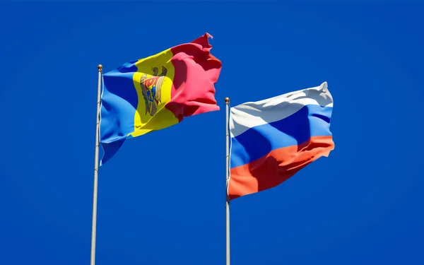 Prachtige Nationale Staatsvlaggen Van Moldavië Rusland Samen Achtergrond Kunstwerkconcept — Stockfoto