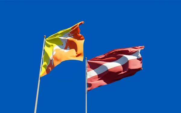 Bandeiras Letónia Butão Obra — Fotografia de Stock