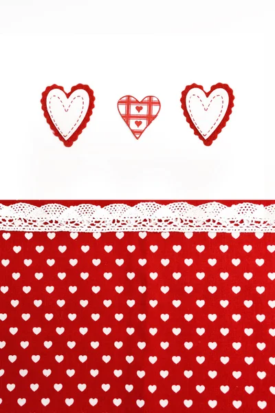 Walentynki tło z ręcznie wykonane serca i tkanina tło — Zdjęcie stockowe