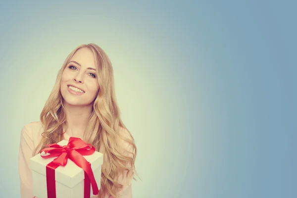 Young woman happy smile hold gift box in hands. — Stock Photo, Image