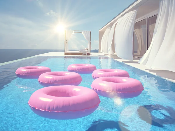 Luxusní bazén s swimmrings. 3D vykreslování — Stock fotografie