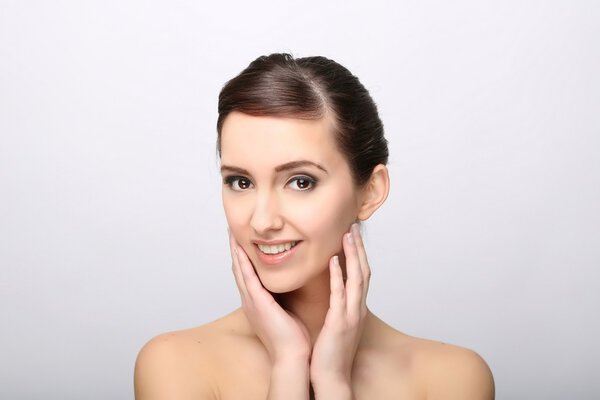 Young woman with beautiful healthy face