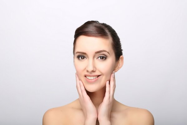 Young woman with beautiful healthy face