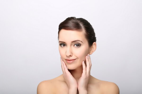 Young woman with beautiful healthy face