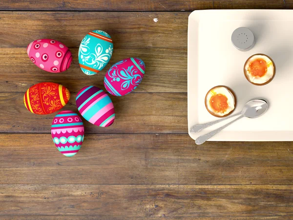 Ovos de Páscoa em fundo de mesa de madeira — Fotografia de Stock