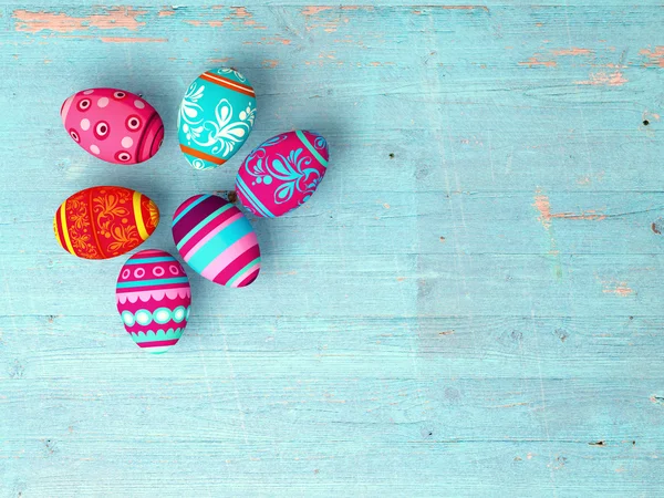 Velikonoční vejce na dřevěný stůl pozadí — Stock fotografie