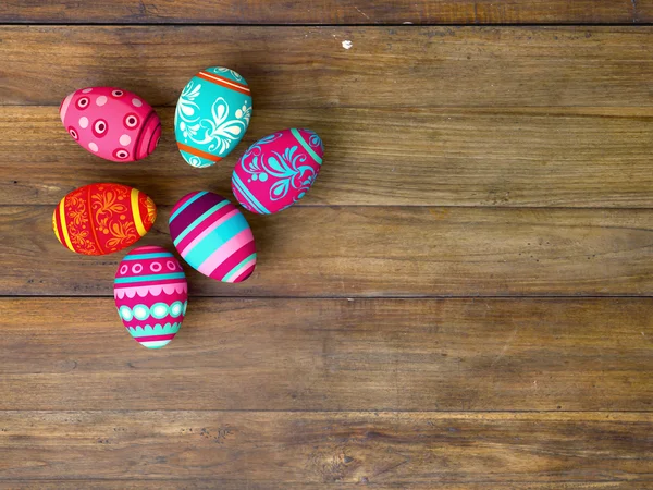 Easter eggs on wooden table background — Stock Photo, Image