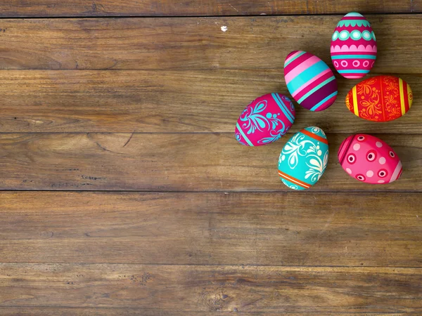 Easter eggs on wooden table background — Stock Photo, Image