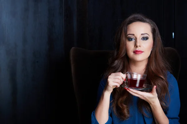 Woman with tea — Stock Photo, Image