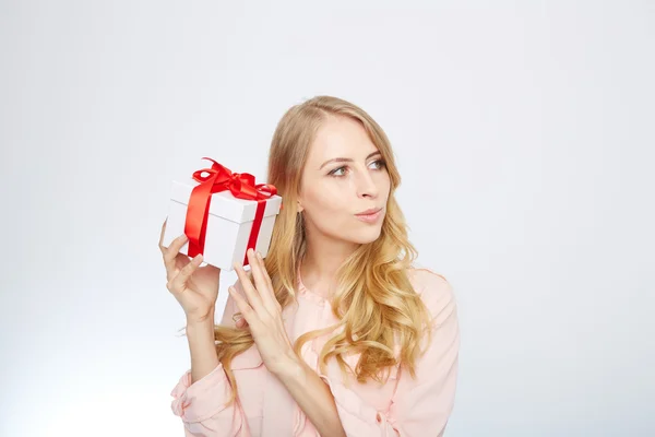 Young blond woman with present box. — Stock Photo, Image