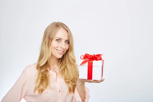 Young blond woman with present box. — Stock Photo, Image