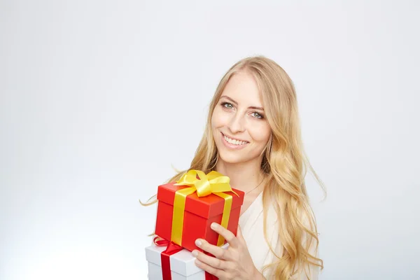 Young blond woman with present box. — Stock Photo, Image