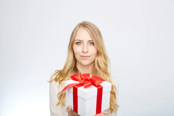 Young blond woman with present box. — Stock Photo, Image