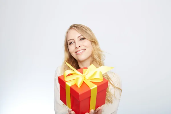 Young blond woman with present box. — Stock Photo, Image