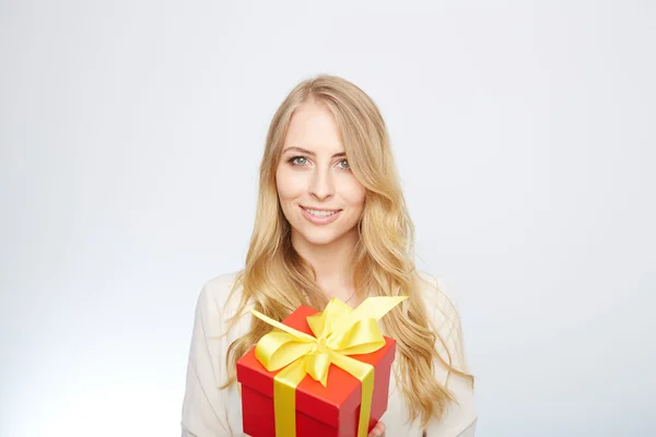 Young blond woman with present box. — Stock Photo, Image