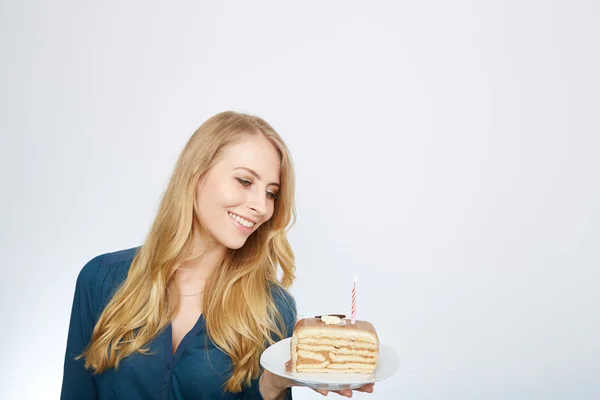 Young woman with a cake — Stock Photo, Image