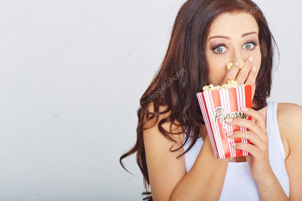 young woman with popcorn