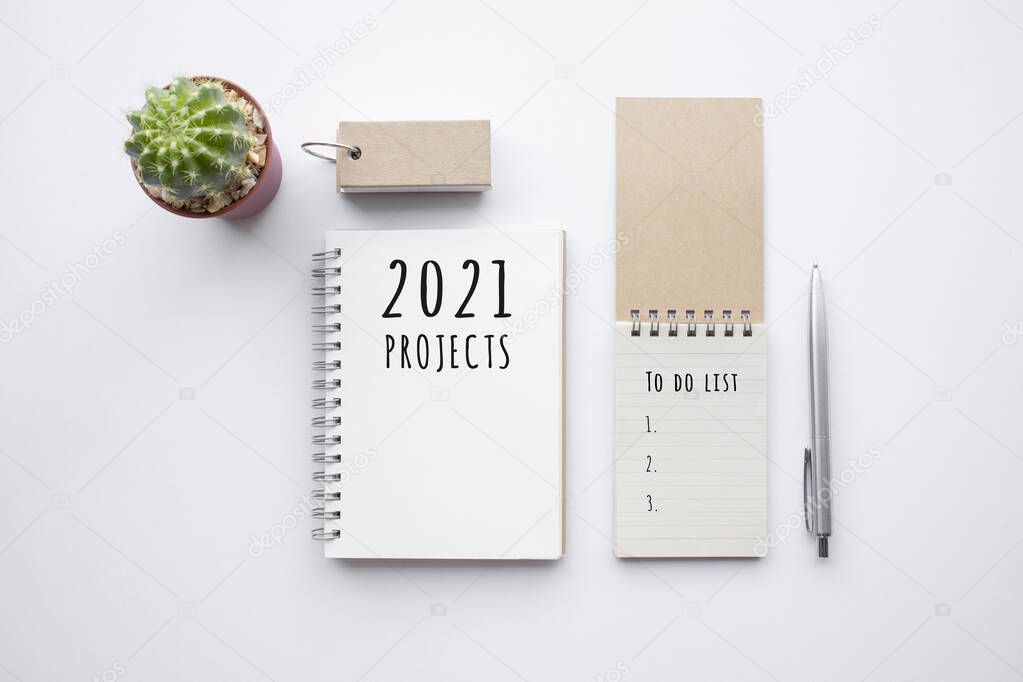 2021 projects or plan concepts with text on notepad and office accessories.Business management,Inspiration to success ideas