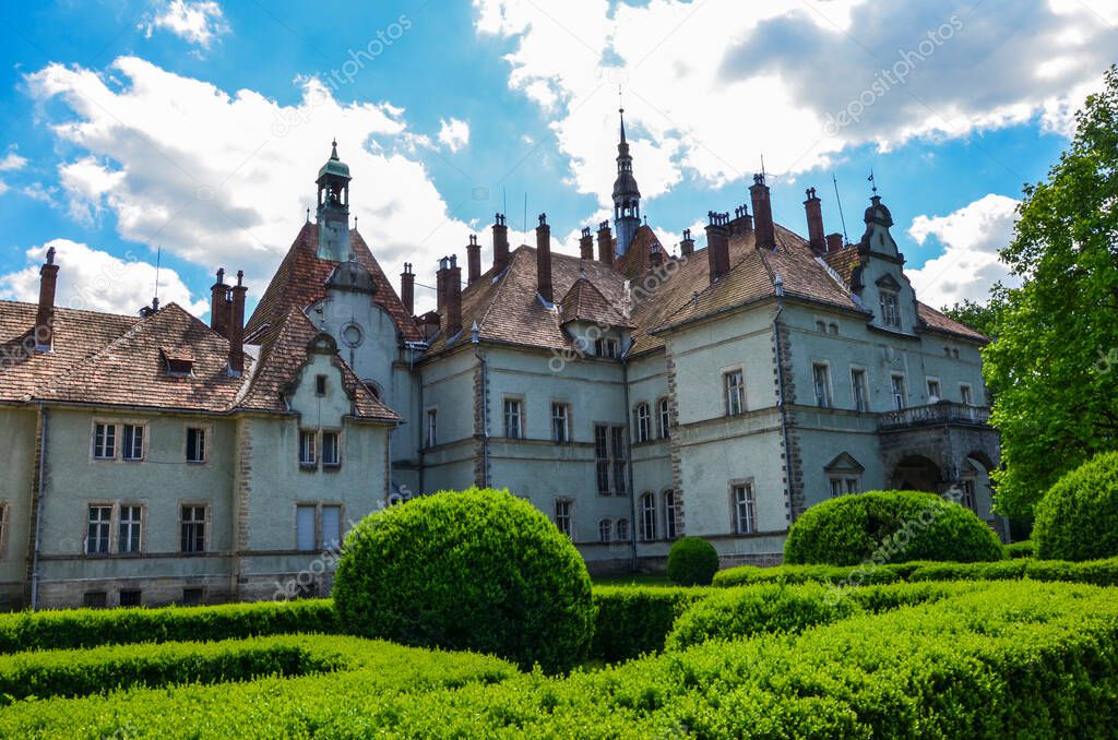 Background of Shenborn Castle in the Ukrainian Carpathian Mountains. Castle with green park in the summer season