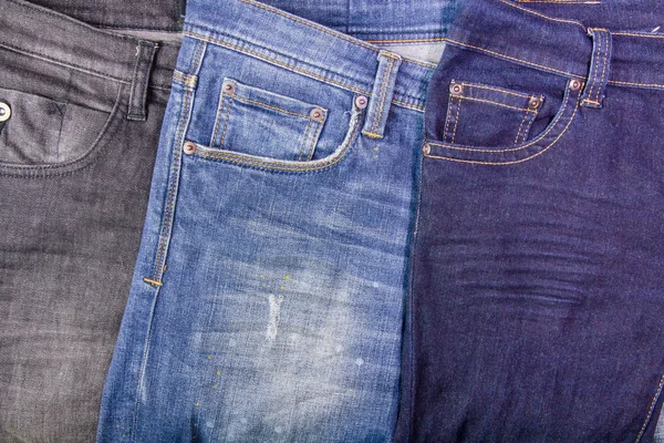 Close up of jeans's pile.Background with jeans material — Stock Photo, Image