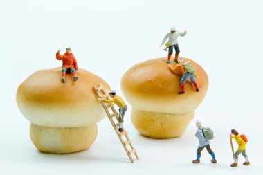 Küçük oyuncaklar tırmanıcı bir ekmek dolgu. Doldurulmuş domuz buns