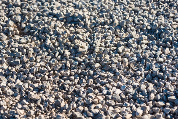 Stone crushed stone on the construction site as an abstract background