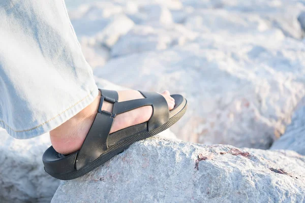 Legs Young Woman Pile Rocks Block Waves Sea —  Fotos de Stock