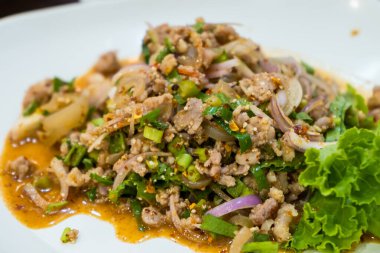 Thai food, spicy minced pork salad.Traditional Thai food.lime, chili and herbs. This food is popular in the north-east of the country