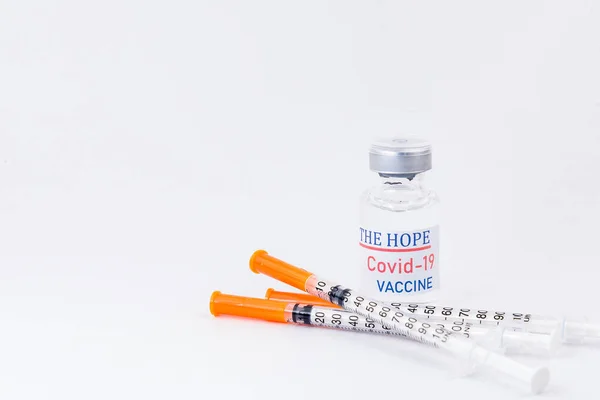 Concept of vaccination and medicine infectious: Syringe with injection vaccine and medicine disposable vaccination equipment. Cure for flu virus, Covid-19, pandemic infectious.concept of humanity\'s