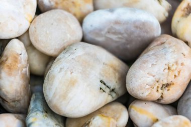 Many stones are lined up. Assemble into the background.White stone background picture