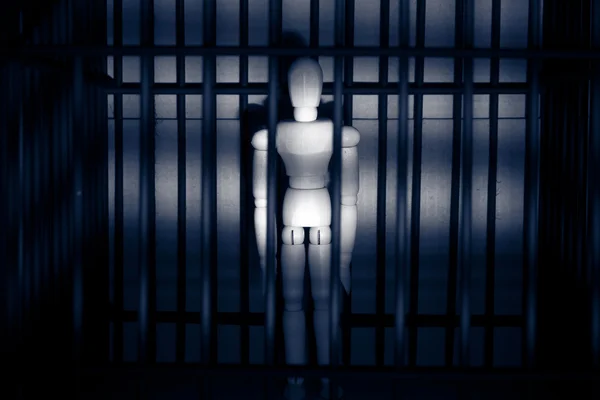 Ξυλόγλυπτες μαριονέτες στη φυλακή — Φωτογραφία Αρχείου