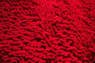 closeup red cleaning doormat or carpet texture clipart