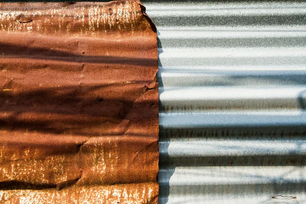 Textura vieja y fondo de cerca de zinc oxidado — Foto de Stock