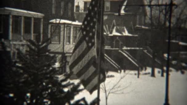 American flag waves in residential neighborhood — Stock Video