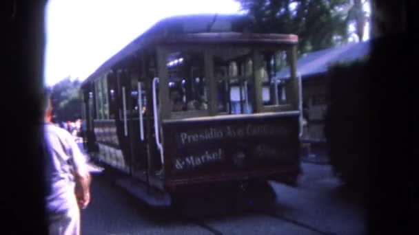A trolley travels down a street — Stock Video