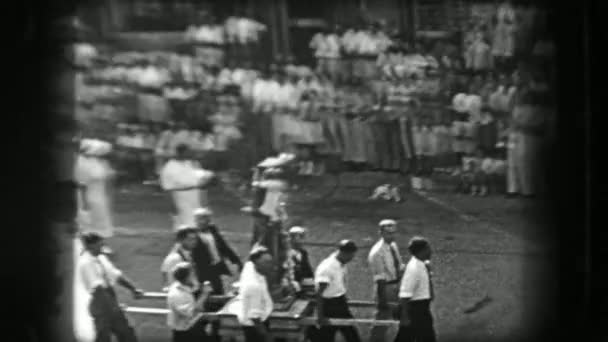 Parade marching carrying large statue — Stockvideo