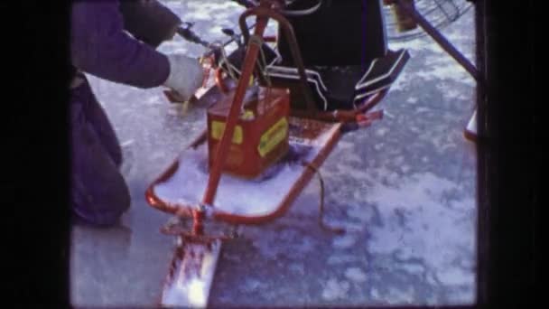 Man maintaining fan hovercraft ski vehicle — Stock Video