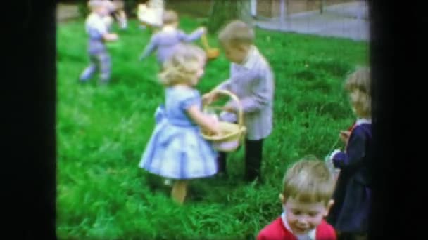 Easter egg hunt in grass — Stockvideo