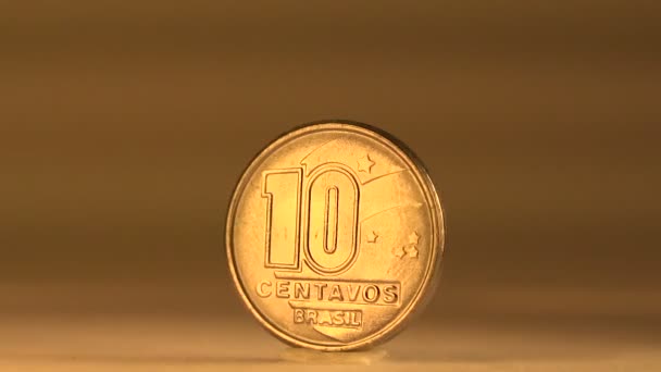 Бразильская монета "10 центавос" — стоковое видео