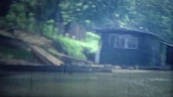 Floating boathouses and living units on the flooded river. — Stock Video