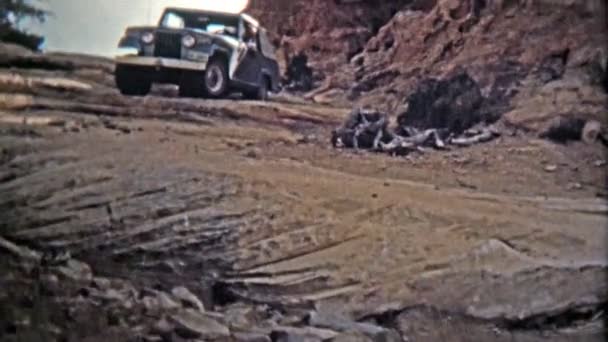 Jeep driving down the famous silver stairs offroad trail and geological rock formation — Stock Video