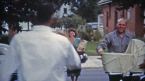 Mom and dad coming to dinner with baby — Stock Video