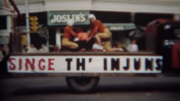 'Singe th Injuns' football parade performance art — Stock Video