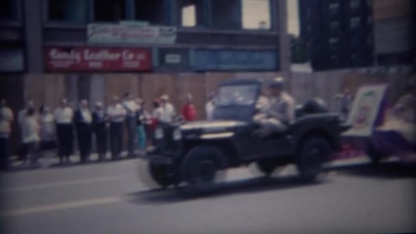 Army jeep pulling parade float of religious  people — Stock Video