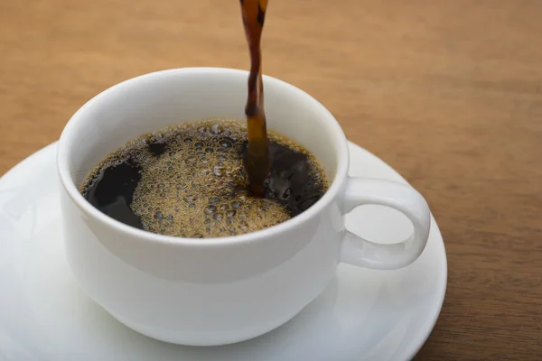 Taza de café en la madera — Foto de Stock