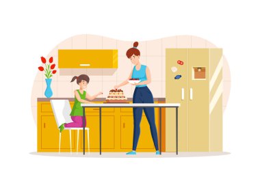 Anne ve kız mutfakta ev yapımı pastayı böğürtlenlerle süsler. Mutlu aile, mutfakta el yapımı taze pişirme tatlısı pişiriyor. Kadın ve kız birlikte tatil ziyafeti hazırlıyorlar.