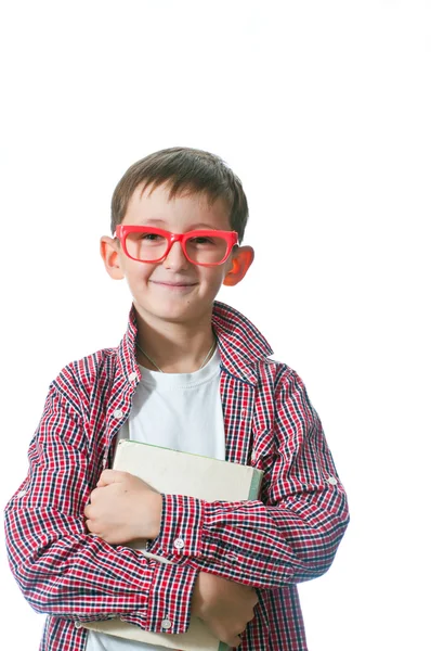 Portrait of a young happy boy in red spectacles . — Stock Photo, Image