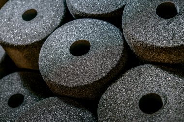 Foam pads in porous disks on the factory stock clipart