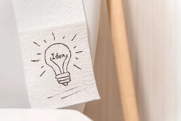 Lightbulb drawn on toilet paper, stock photo — Stock Photo, Image