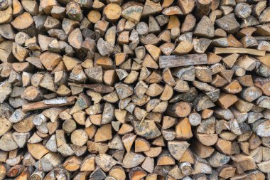Yığınla kuru yakacak odunlarının arka planı